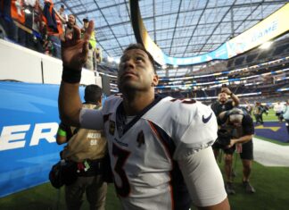 NFL’s Russell Wilson Urges Fans to #PassThePeace to Domestic Violence Survivors