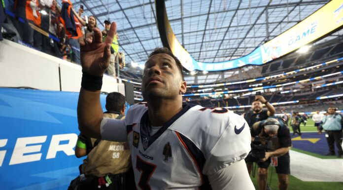 NFL’s Russell Wilson Urges Fans to #PassThePeace to Domestic Violence Survivors