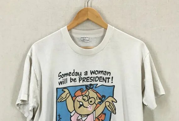 Wal-Mart Pulls ‘Someday a Woman Will Be President’ T-Shirt: Backlash Ensues