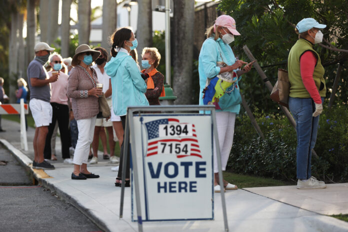 Across The U.S. Voters Flock To The Polls On Election Day