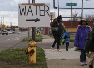Flint Residents Cut Off from Free Bottled Water Despite Ongoing Crisis