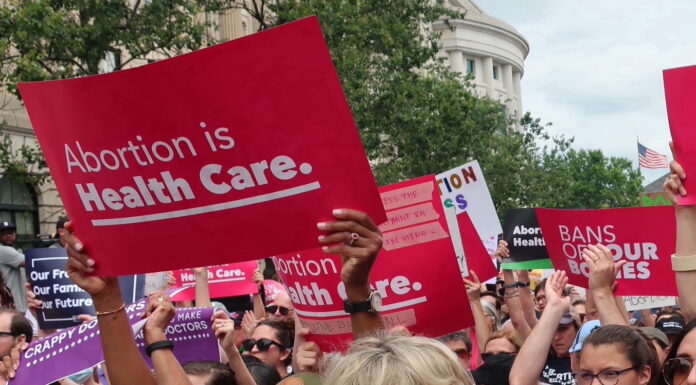 North Carolina Anti-Abortion Activist Faces Trial Over ‘Wanted’ Posters