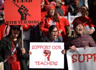 Denver Teachers Continue Strike on Second Day Over Pay Disputes