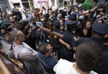 Ax-Wielding Priest Pleads Guilty to Attack on Abortion Clinic Faces Lenient Sentence