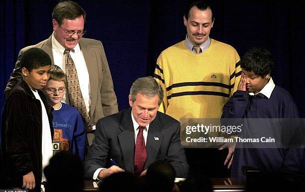 Bush Signs Controversial Faith-Based Initiative into Law