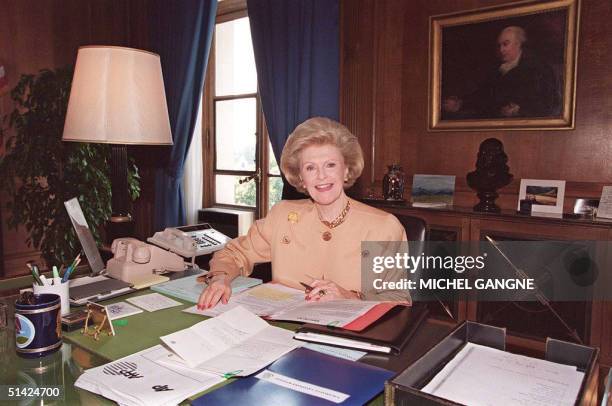 us-ambassador-to-france-pamela-harriman-poses-at-her-desk-in-her-office-in-paris-july-07
