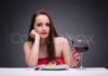 The Quiet Luxury of a Woman Eating Alone in Peace