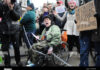 The Protestor in a Wheelchair Blocking Traffic