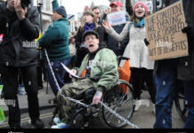 The Protestor in a Wheelchair Blocking Traffic