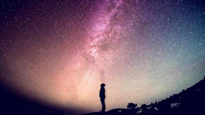 man-gazing-at-night-sky