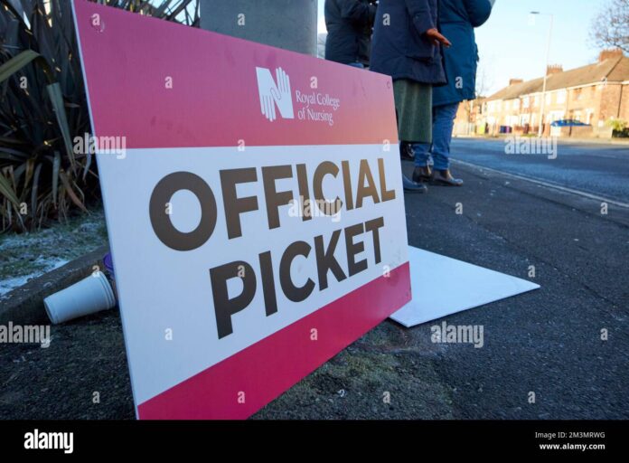 rcn-official-picket-line-sign-on-the-picket-line-during-strike-day-outside-aintree-university-hospital-fazakerley-liverpool-england-uk-15th-december-2-2M3MRWG
